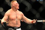LAS VEGAS - JULY 11:  Brock Lesnar reacts after knocking out Frank Mir during their heavyweight title bout during UFC 100 on July 11, 2009 in Las Vegas, Nevada.  (Photo by Jon Kopaloff/Getty Images)