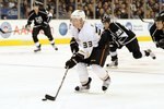 LOS ANGELES, CA - APRIL 03:  Jason Blake #33 of the Anaheim Ducks breaks in past Randy Jones #12 of the Los Angeles Kings at the Staples Center on April 3, 2010 in Los Angeles, California.  (Photo by Harry How/Getty Images)