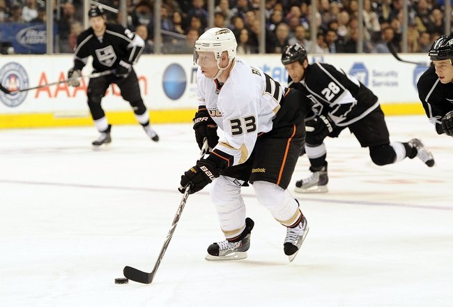 LOS ANGELES, CA - APRIL 03:  Jason Blake #33 of the Anaheim Ducks breaks in past Randy Jones #12 of the Los Angeles Kings at the Staples Center on April 3, 2010 in Los Angeles, California.  (Photo by Harry How/Getty Images)