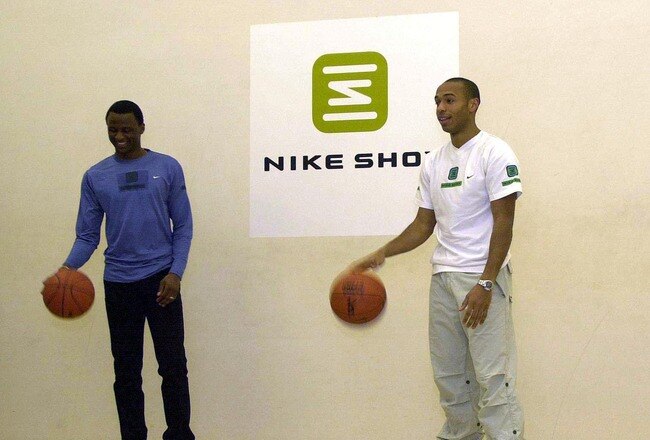 16 Jan 2001:  Patrick Vieira and Thierry Henry of Arsenal practice some basketball at the launch of the new Nike Shox training shoes at the Dolphin Square Hotel, London. Mandatory Credit: Tom Shaw/ALLSPORT