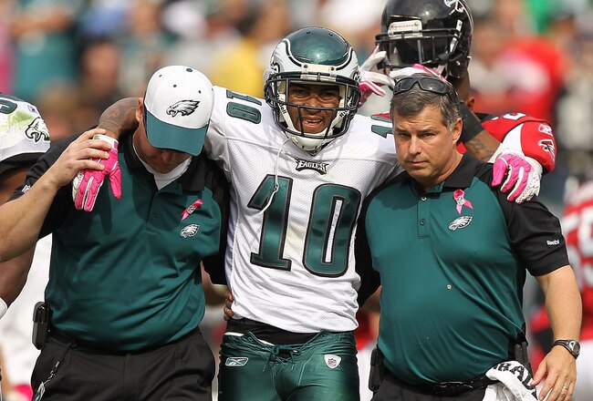 PHILADELPHIA - OCTOBER 17:  DeSean Jackson #10 of the Philadelphia Eagles is helped off the field after being  laid out by Dunta Robinson #23 of the Atlanta Falcons during their game at Lincoln Financial Field on October 17, 2010 in Philadelphia, Pennsylvania.  Both players were injured on the play and had to be helped off the field.  (Photo by Al Bello/Getty Images)