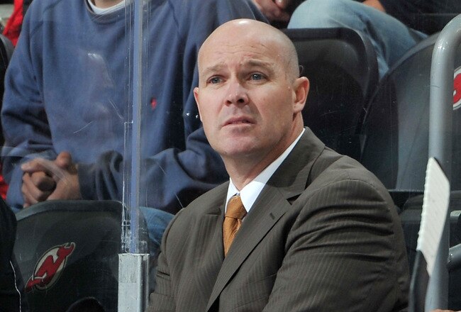 NEWARK, NJ - OCTOBER 16: John MacLean head coach of the New Jersey Devils watches the game action against the Boston Bruins during the second period at the Prudential Center on October 16, 2010 in Newark, New Jersey. The Bruins defeated the Devils 4-1. (Photo by Christopher Pasatieri/Getty Images)