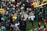 SOUTH BEND, IN - SEPTEMBER 25: Head coach Brian Kelly of the Notre Dame Fighting Irish leads his team onto the field before taking on the Stanford Cardinal at Notre Dame Stadium on September 25, 2010 in South Bend, Indiana. Stanford defeated Notre Dame 37-14. (Photo by Jonathan Daniel/Getty Images)