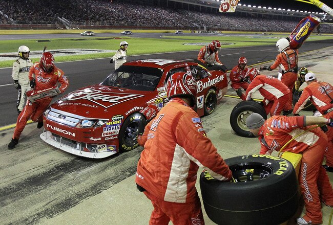 CONCORD, NC - OCTOBER 16:  Kasey Kahne pits the #9 Buidweiser Ford, during the NASCAR Sprint Cup Series Bank of America 500 at Charlotte Motor Speedway on October 16, 2010 in Concord, North Carolina.  (Photo by Tom Whitmore/Getty Images for NASCAR)