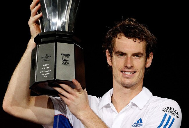 SHANGHAI, CHINA - OCTOBER 17:  Andy Murray of Great Britain poses for photographers after defeating Roger Federer of Switzerland during the final on day seven of the 2010 Shanghai Rolex Masters at the Shanghai Qi Zhong Tennis Center on October 17, 2010 in Shanghai, China.  (Photo by Matthew Stockman/Getty Images)