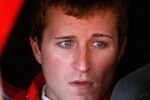 FONTANA, CA - OCTOBER 08: Kasey Kahne, driver of the #9 Budweiser Ford sits in his car during practice for the NASCAR Sprint Cup Series Pepsi Max 400 on October 8, 2010 in Fontana, California.  (Photo by Jerry Markland/Getty Images for NASCAR)