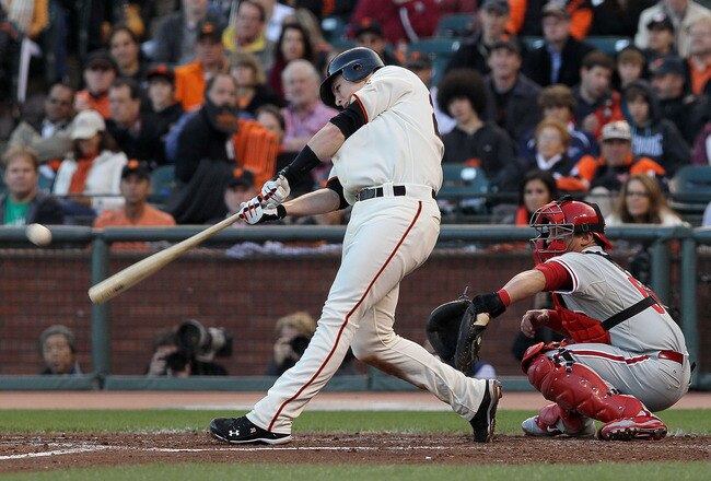 SAN FRANCISCO - OCTOBER 20:  Buster Posey #28 of the San Francisco Giants hits an RBI double against the Philadelphia Phillies in the third inning of Game Four of the NLCS during the 2010 MLB Playoffs at AT&T Park on October 20, 2010 in San Francisco, California.  (Photo by Justin Sullivan/Getty Images)