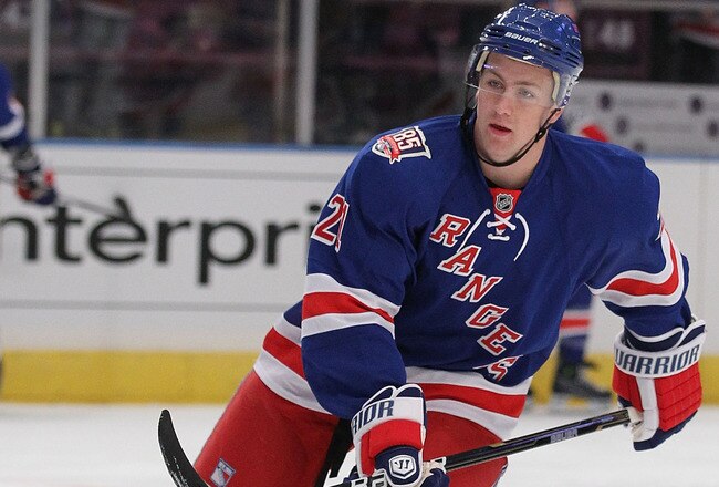 NEW YORK - OCTOBER 15:  Derek Stepan #21 of the New York Rangers in action against the Toronto Maple Leafs during their game on October 15, 2010 at Madison Square Garden in New York City.  (Photo by Al Bello/Getty Images)