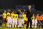 BELGRADE, SERBIA - SEPTEMBER 28:  Arsenal manager Arsene Wenger walks past his team on the way to the bench before the UEFA Champions League Group H match between FK Partizan and Arsenal at the Partizan Stadium on September 28, 2010 in Belgrade, Serbia.  (Photo by Michael Regan/Getty Images)