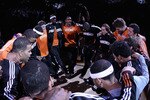 PHOENIX - OCTOBER 19:  The Phoenix Suns huddle on the court before a preseason NBA game against the Golden State Warriors at US Airways Center on October 19, 2010 in Phoenix, Arizona. NOTE TO USER: User expressly acknowledges and agrees that, by downloading and or using this photograph, User is consenting to the terms and conditions of the Getty Images License Agreement.  (Photo by Christian Petersen/Getty Images)