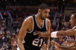PHOENIX - MAY 05:  Tim Duncan #21 of the San Antonio Spurs handles the ball during Game Two of the Western Conference Semifinals of the 2010 NBA Playoffs against the Phoenix Suns at US Airways Center on May 5, 2010 in Phoenix, Arizona. The team is wearing 'Los Suns' jerseys on Cinco de Mayo in response to an anti-immigration law recently passed in Arizona.  The Suns defeated the Spurs 110-102 to take a 2-0 series lead.  NOTE TO USER: User expressly acknowledges and agrees that, by downloading and or using this photograph, User is consenting to the terms and conditions of the Getty Images License Agreement.  (Photo by Christian Petersen/Getty Images)