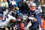 FOXBORO, MA - JANUARY 10:  Terrell Suggs #55 of the Baltimore Ravens stripes the ball from Tom Brady #12 of the New England Patriots during the first quarter of  the 2010 AFC wild-card playoff game at Gillette Stadium on January 10, 2010 in Foxboro, Massachusetts.  (Photo by Jim Rogash/Getty Images)