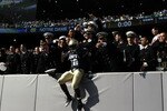 EAST RUTHERFORD, NJ - OCTOBER 23: Andre Byrd #20 of the Navy Midshipmen celebrates the win against the Notre Dame Fighting Irish at New Meadowlands Stadium on October 23, 2010 in East Rutherford, New Jersey.  (Photo by Nick Laham/Getty Images)