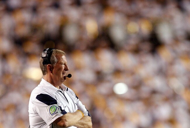 BATON ROUGE, LA - SEPTEMBER 25:  Head coach Bill Stewart of the West Virginia Mountaineers watches a play against the  Louisiana State University Tigers at Tiger Stadium on September 25, 2010 in Baton Rouge, Louisiana.  The Tigers defeated the Mountaineers 20-14.  (Photo by Chris Graythen/Getty Images)