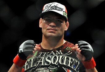 LOS ANGELES, CA - OCTOBER 24:  UFC fighter Cain Velasquez poses after his victory over UFC fighter Ben Rothwell (not pictured) in their Heavyweight bout at UFC 104: Machida vs. Shogun at Staples Center on October 24, 2009 in Los Angeles, California.  Velasquez won the fight by way of TKO.  (Photo by Jon Kopaloff/Getty Images)