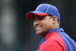 ARLINGTON, TX - OCTOBER 22:  Bengie Molina #11 of the Texas Rangers looks on during batting practice prior to playing the New York Yankees in Game Six of the ALCS during the 2010 MLB Playoffs at Rangers Ballpark in Arlington on October 22, 2010 in Arlington, Texas.  (Photo by Elsa/Getty Images)