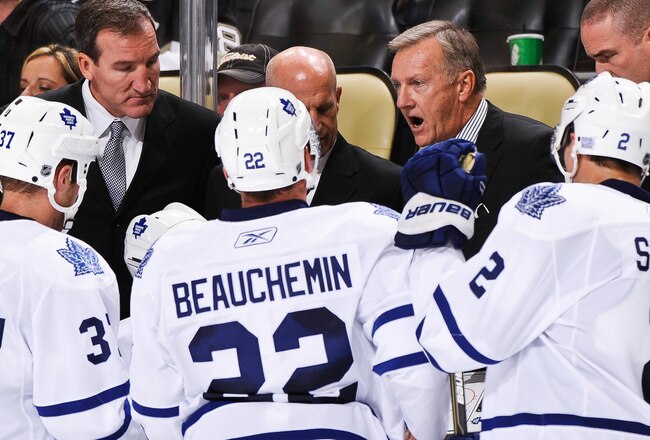 PITTSBURGH - OCTOBER 13:  Head Coach Ron Wilson of the Toronto Maple Leafs instructs his team during a time out during a game against the Pittsburgh Penguins on October 13, 2010 at Consol Energy Center in Pittsburgh, Pennsylvania.  (Photo by Jamie Sabau/Getty Images)