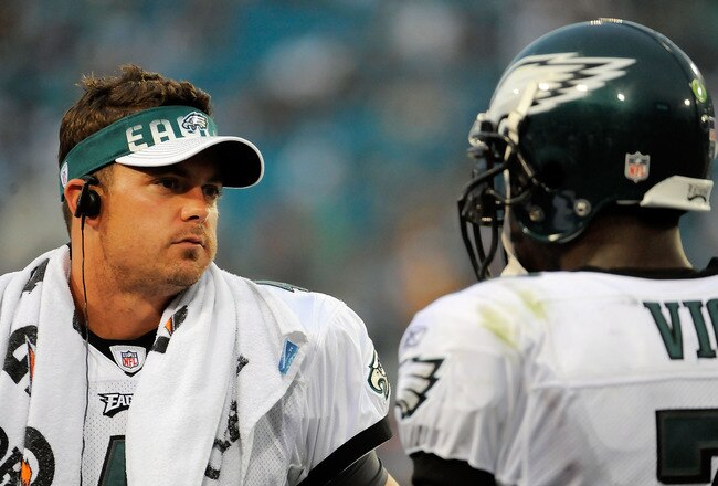 JACKSONVILLE, FL - SEPTEMBER 26:  Quarterbacks Kevin Kolb #4 and Michael Vick #7 of the Philadelphia Eagles talk on the sidelines during a time-out against the Jacksonville Jaguars at EverBank Field on September 26, 2010 in Jacksonville, Florida. The Eagles defeated the Jaguars 28-3.  (Photo by Doug Benc/Getty Images)