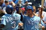 KANSAS CITY, MO - JULY 28:  Billy Butler #16 of the Kansas City Royals congratulates Yuniesky Betancourt #3 after a run during the game against  the Minnesota Twins on July 28, 2010 at Kauffman Stadium in Kansas City, Missouri.  (Photo by Jamie Squire/Getty Images)