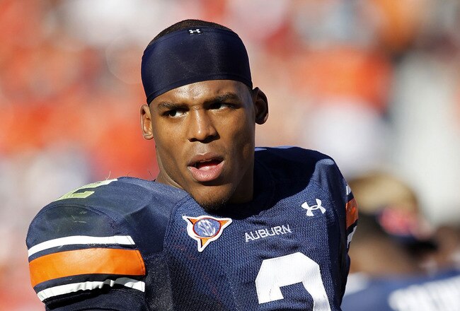 AUBURN, AL - OCTOBER 16:  Quarterback Cam Newton #2 of the Auburn Tigers walks on the sideline during the game against the Arkansas Razorbacks at Jordan-Hare Stadium on October 16, 2010 in Auburn, Alabama.  (Photo by Mike Zarrilli/Getty Images)