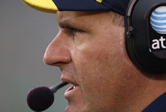 SOUTH BEND, IN - SEPTEMBER 11: Head coach Rich Rodriguez of the Michigan Wolverines watches as his team takes on the Notre Dame Fighting Irish at Notre Dame Stadium on September 11, 2010 in South Bend, Indiana. Michigan defeated Notre Dame 28-24.  (Photo by Jonathan Daniel/Getty Images)