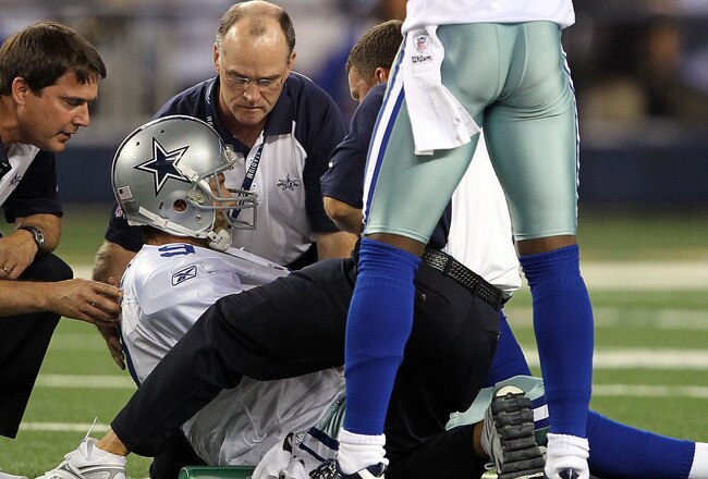ARLINGTON, TX - OCTOBER 25:  Quarterback Tony Romo #9 of the Dallas Cowboys lies on the field after a left shoulder injury in the second quarter against the New York Giants at Cowboys Stadium on October 25, 2010 in Arlington, Texas.  (Photo by Ronald Martinez/Getty Images)
