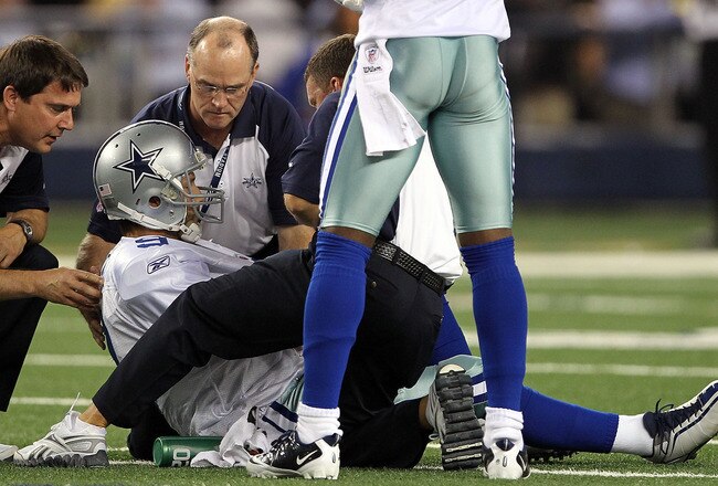 ARLINGTON, TX - OCTOBER 25:  Quarterback Tony Romo #9 of the Dallas Cowboys lies on the field after a left shoulder injury in the second quarter against the New York Giants at Cowboys Stadium on October 25, 2010 in Arlington, Texas.  (Photo by Ronald Martinez/Getty Images)