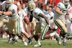 AUSTIN, TX - NOVEMBER 8:  Quarterback Robert Griffin #10 of the Baylor Bears runs the ball during the game against the Texas Longhorns on November 8, 2008 at Darrell K Royal-Texas Memorial Stadium in Austin, Texas.  Texas won 45-21. (Photo by Brian Bahr/Getty Images)