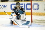 SAN JOSE, CA - SEPTEMBER 29: Goalie Antero Niittymaki #30 blocks a shot on goal against the Vancouver Canucks during their preseason game on September 29, 2010 at the HP Pavilion in San Jose, California. The Sharks won the game 6-2. (Photo by Thearon W. Henderson/Getty Images)