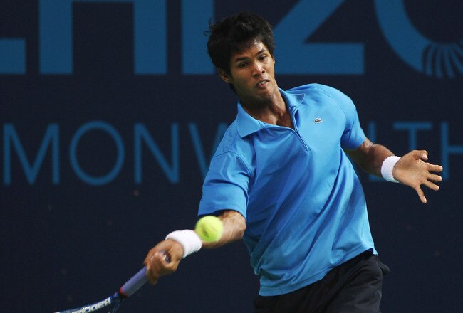 DELHI, INDIA - OCTOBER 10:  Gold medal winner Somdev Devvarman of India plays a forehand against Greg Jones of Australia during the men's singles final at RK Khanna Tennis Stadium during day seven of the Delhi 2010 Commonwealth Games on October 10, 2010 in Delhi, India.  (Photo by Daniel Berehulak/Getty Images)