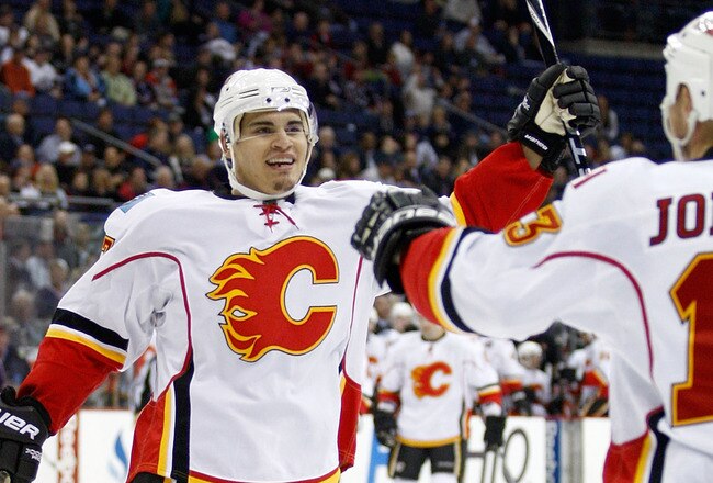 COLUMBUS, OH - OCTOBER 22:  Rene Bourque #17 of the Calgary Flames is congratulated by Olli Jokinen #13 of the Calgary Flames after scoring a shorthanded goal against the Columbus Blue Jackets during the first period on October 22, 2010 at Nationwide Arena in Columbus, Ohio.  (Photo by John Grieshop/Getty Images)