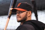 SAN FRANCISCO - OCTOBER 25:  Cody Ross #13 of the San Francisco Giants looks on during a team workout at AT&T Park on October 25, 2010 in San Francisco, California. The Giants are preparing to face the Texas Rangers in the 2010 World Series.  (Photo by Justin Sullivan/Getty Images)