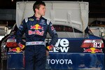 MARTINSVILLE, VA - OCTOBER 23:  Kasey Kahne, driver of the #83 Red Bull Toyota, stands in the garage prior to practice for the NASCAR Sprint Cup Series TUMS Fast Relief 500 at Martinsville Speedway on October 23, 2010 in Martinsville, Virginia.  (Photo by Jared C. Tilton/Getty Images for NASCAR)