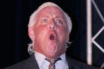 CONCORD, NC - JANUARY 20:  Former American Professional Wrestler Ric Flair performs his famous yell 'Wooooo!', for the media during the NASCAR Sprint Media Tour hosted by Charlotte Motor Speedway, held at the Embassy Suites, on January 20, 2010 in Concord, North Carolina.  (Photo by Jason Smith/Getty Images)