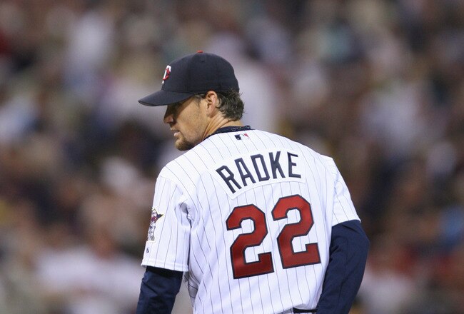 MINNEAPOLIS - APRIL 11: Pitcher Brad Radke #22 of the Minnesota Twins lines up the pitch during the game against the Oakland Athletics on April 11, 2006 at the Hubert H. Humphrey Metrodome in Minneapolis, Minnesota. (Photo by David Sherman/Getty Images)