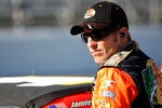 MARTINSVILLE, VA - OCTOBER 22:  Jamie McMurray, driver of the #1 Bass Pro Shops/Tracker Boats Chevrolet, stands on pit road during qualifying for the NASCAR Sprint Cup Series TUMS Fast Relief 500 at Martinsville Speedway on October 22, 2010 in Martinsville, Virginia.  (Photo by Geoff Burke/Getty Images for NASCAR)