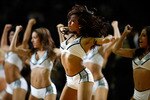 SAN ANTONIO - OCTOBER 09:  Cheerleaders perform during the game between the Miami Heat and the San Antonio Spurs at the AT&T Center on October 9, 2010 in San Antonio, Texas.  NOTE TO USER: User expressly acknowledges and agrees that, by downloading and/or using this Photograph, User is consenting to the terms and conditions of the Getty Images License Agreement.  (Photo by Chris Graythen/Getty Images)