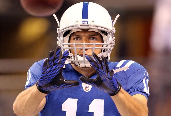 INDIANAPOLIS - SEPTEMBER 02:  Anthony Gonzalez #11 of the Indianapolis Colts catches a pass before the NFL preseason game against the Cincinnati Bengals at Lucas Oil Stadium on September 2, 2010 in Indianapolis, Indiana.  (Photo by Andy Lyons/Getty Images)