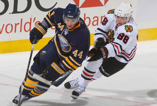 BUFFALO, NY - OCTOBER 11: Andrej Sekera #44 of the Buffalo Sabres skates ahead of Patrick Kane #88 of the Chicago Blackhawks at HSBC Arena on October 11, 2010 in Buffalo, New York. Chicago won 4-3. (Photo by Rick Stewart/Getty Images)