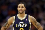 PHOENIX - OCTOBER 12:  Deron Williams #8 of the Utah Jazz in action during the preseason NBA game against the Phoenix Suns at US Airways Center on October 12, 2010 in Phoenix, Arizona. NOTE TO USER: User expressly acknowledges and agrees that, by downloading and or using this photograph, User is consenting to the terms and conditions of the Getty Images License Agreement.  (Photo by Christian Petersen/Getty Images)
