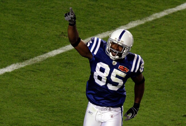 MIAMI GARDENS, FL - FEBRUARY 07:  Pierre Garcon #85 of the Indianapolis Colts runs off the field after making a catch for a touchdown in the first quarter against the New Orleans Saints during the first quarter Super Bowl XLIV on February 7, 2010 at Sun Life Stadium in Miami Gardens, Florida.  (Photo by Doug Benc/Getty Images)