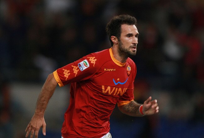 ROME - SEPTEMBER 25:  Mirko Vucinic of AS Roma celebrates after scoring  the 1-0 goal in the 90th minute during the Serie A match between AS Roma and FC Internazionale Milano at Stadio Olimpico on September 25, 2010 in Rome, Italy.  (Photo by Paolo Bruno/Getty Images)