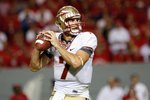 RALEIGH, NC - OCTOBER 16:  Christian Ponder #7 of the Florida State Seminoles drops back to pass during the game against the North Carolina State Wolfpack at Carter-Finley Stadium on October 16, 2008 in Raleigh, North Carolina.  (Photo by Kevin C. Cox/Getty Images)