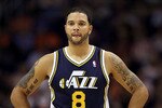 PHOENIX - OCTOBER 12:  Deron Williams #8 of the Utah Jazz in action during the preseason NBA game against the Phoenix Suns at US Airways Center on October 12, 2010 in Phoenix, Arizona. NOTE TO USER: User expressly acknowledges and agrees that, by downloading and or using this photograph, User is consenting to the terms and conditions of the Getty Images License Agreement.  (Photo by Christian Petersen/Getty Images)