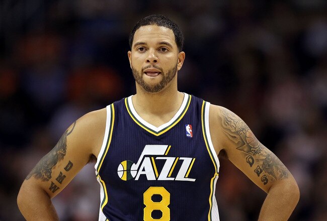 PHOENIX - OCTOBER 12:  Deron Williams #8 of the Utah Jazz in action during the preseason NBA game against the Phoenix Suns at US Airways Center on October 12, 2010 in Phoenix, Arizona. NOTE TO USER: User expressly acknowledges and agrees that, by downloading and or using this photograph, User is consenting to the terms and conditions of the Getty Images License Agreement.  (Photo by Christian Petersen/Getty Images)