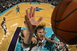 NEW ORLEANS - OCTOBER 27:  Andrew Bogut #6 of the Milwaukee Bucks grabs a rebound during the game against the New Orleans Hornets at the New Orleans Arena on October 27, 2010 in New Orleans, Louisiana.   The Hornets defeated the Bucks 95-91.   NOTE TO USER: User expressly acknowledges and agrees that, by downloading and or using this photograph, User is consenting to the terms and conditions of the Getty Images License Agreement.  (Photo by Chris Graythen/Getty Images)