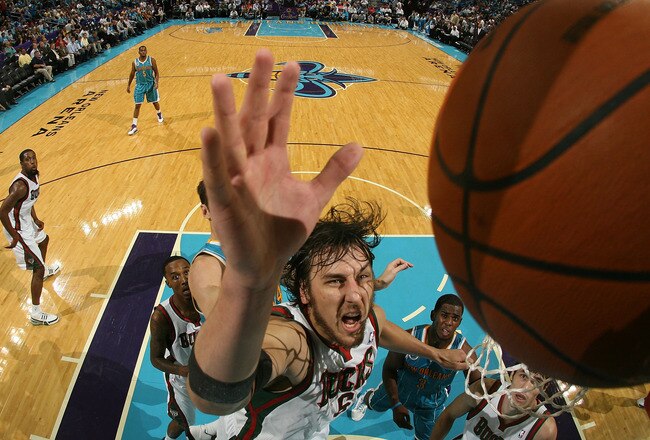 NEW ORLEANS - OCTOBER 27:  Andrew Bogut #6 of the Milwaukee Bucks grabs a rebound during the game against the New Orleans Hornets at the New Orleans Arena on October 27, 2010 in New Orleans, Louisiana.   The Hornets defeated the Bucks 95-91.   NOTE TO USER: User expressly acknowledges and agrees that, by downloading and or using this photograph, User is consenting to the terms and conditions of the Getty Images License Agreement.  (Photo by Chris Graythen/Getty Images)