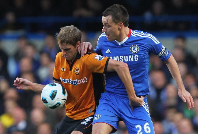 LONDON, ENGLAND - OCTOBER 23:  Dave Edwards of Wolverhampton Wanderers is challenged by John Terry of Chelsea during the Barclays Premier League match between Chelsea and Wolverhampton Wanderers at Stamford Bridge on October 23, 2010 in London, England.  (Photo by Clive Rose/Getty Images)