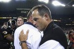 ST. LOUIS, MO - AUGUST 31:  Head coach Gary Pinkel of the Missouri Tigers is congratulated on his teams win over the Illinois Fighting Illini during the game at the Edward Jones Dome on August 31, 2002 in St. Louis, Missouri.  Missouri won 33-20.   (Photo by Elsa/Getty Images)