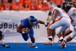 BOISE, ID - SEPTEMBER 25:  Running back Doug Martin #22 of the Boise State Broncos runs the ball against the Oregon State Beavers at Bronco Stadium on September 25, 2010 in Boise, Idaho.  (Photo by Otto Kitsinger III/Getty Images)